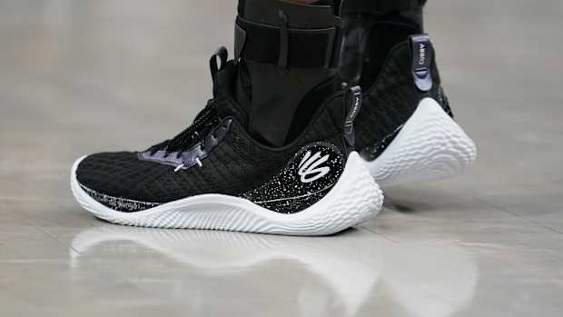 View of Stephen Curry's black and white Under Armour shoes.